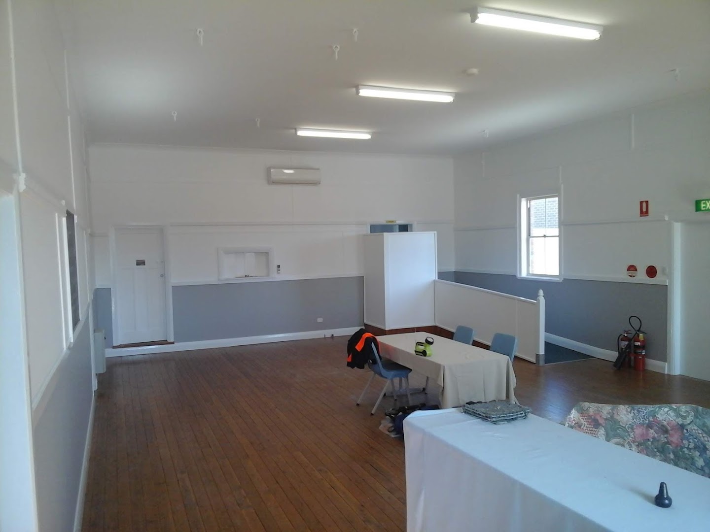 An empty interior with new floorboards and freshly painted walls